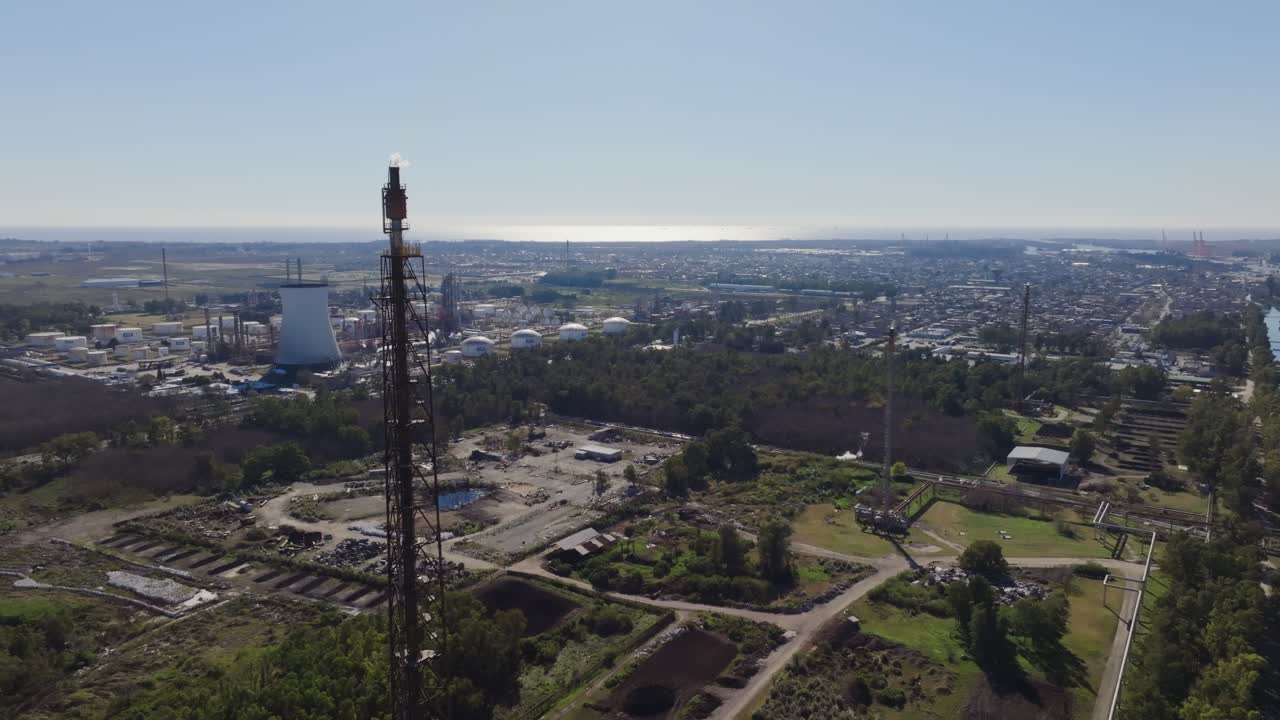 Oil refinery in Argentina with flare stack and energy processing tanks