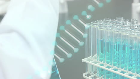 animation of dna strand over scientist with test tubes