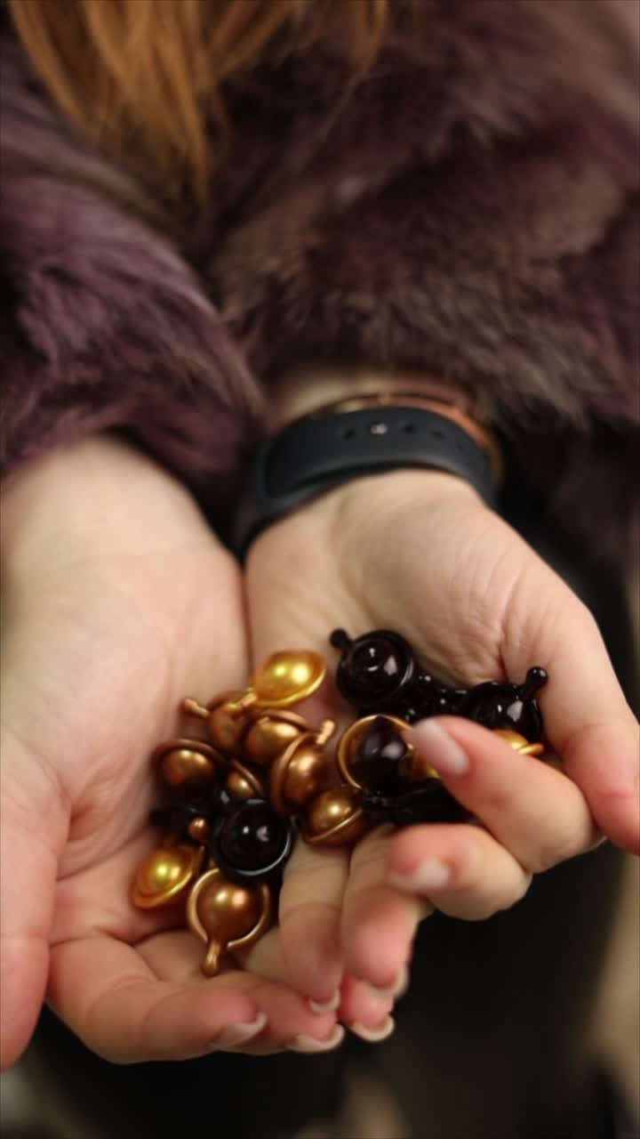 Woman Holding Face Serum Capsules