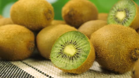 ripe whole and half kiwi fruit