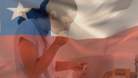 Chilean-flag-waving-against-woman-with-thermometer-coughing