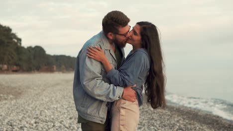 couple enjoying the sunset on the beach