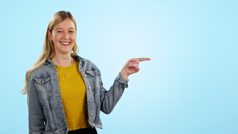 Woman,-face-and-pointing-to-choice-in-studio