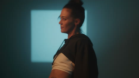 woman dancing in low-light