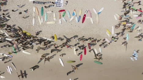 4k top view drone shot of the protest against norwegian oil company at byron bay, new south wales, australia - 2019