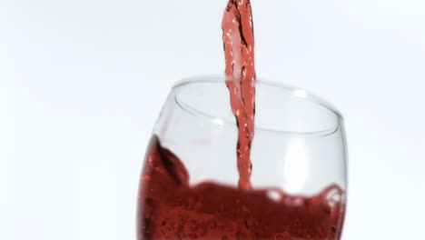 red wine being poured in super slow motion