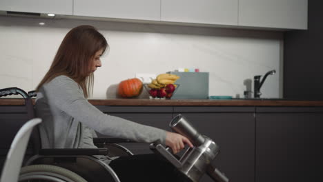 housewife with spinal cord injury cleans with vacuum cleaner