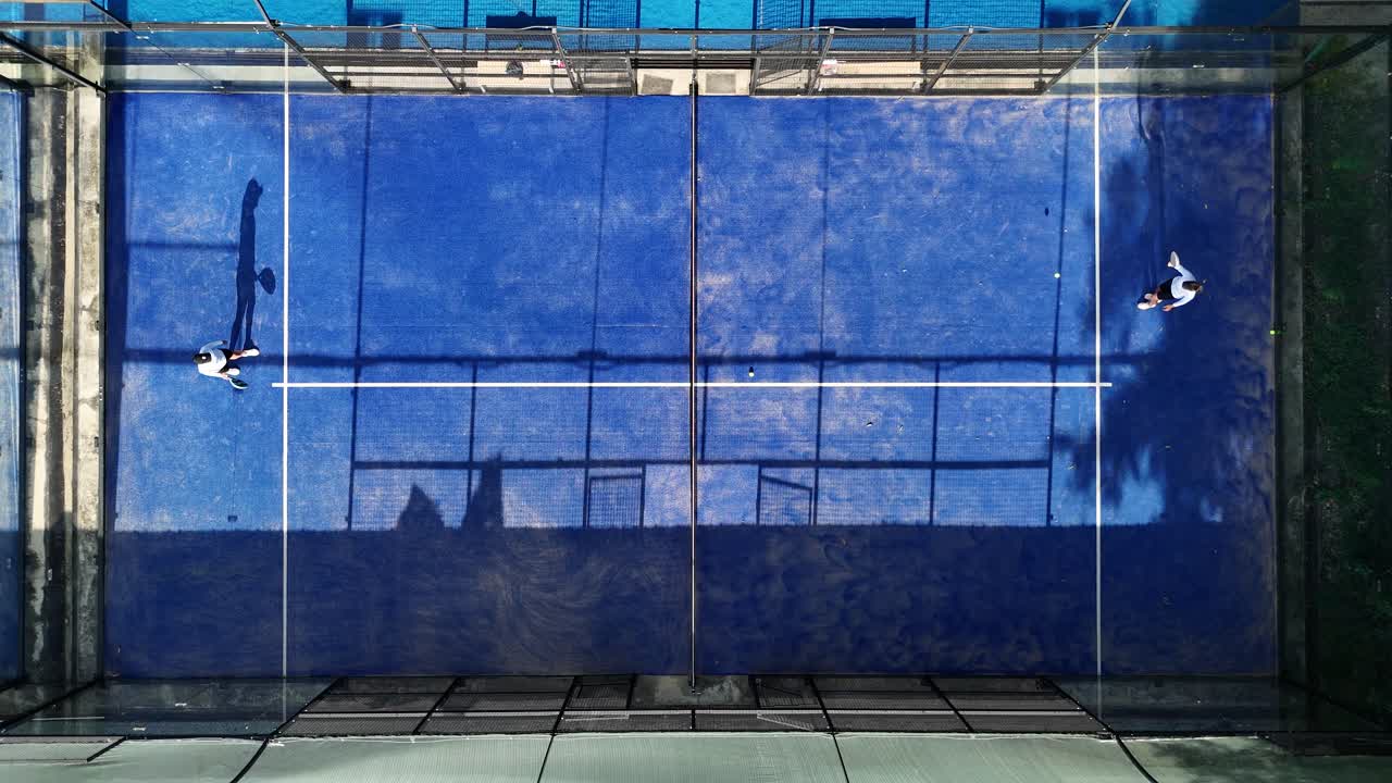 Aerial view of padel court with players