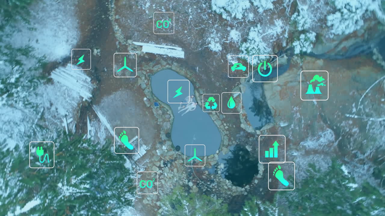 Aerial view showing stone-lined pond in snowy forest, with floating green climate technology icons