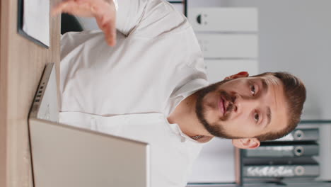 business man working online on laptop positive feedback like approving application good offer