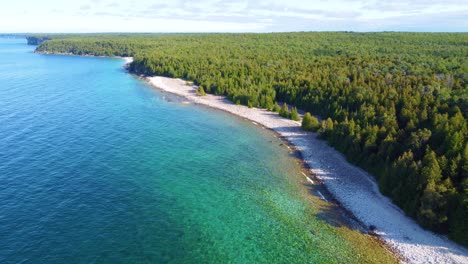 drone shot of the pristine and picturesque coastline and boreal forest of georgian bay located in ontario, canada