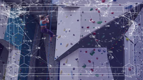 Animation-of-data-processing-over-caucasian-woman-climbing-wall