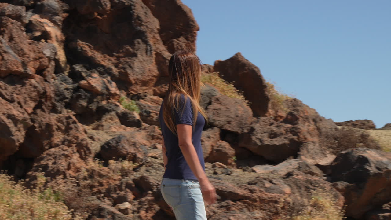 Tourist walking in Teide National Park, Tenerife, Canary Islands