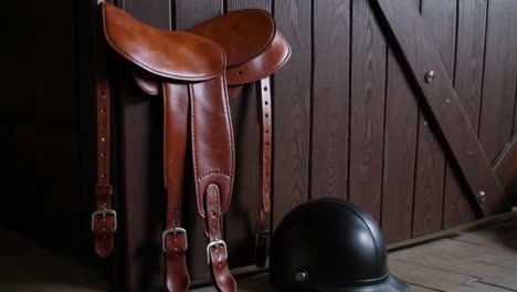 horse riding gear in a stable