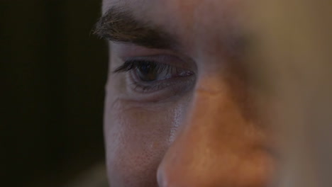 young smiling man with focus on the eyes