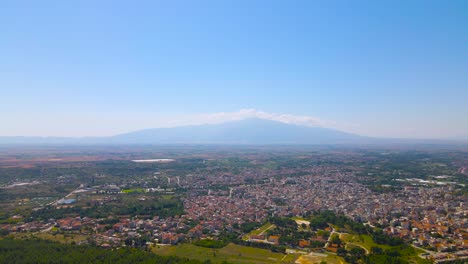 Aerial-drone-4k-clip-landing-over-the-mount-of-Korilovos-in-the-area-of-Drama-in-Northern-Greece,-next-to-a-big-cross-on-the-top-of-the-mountain