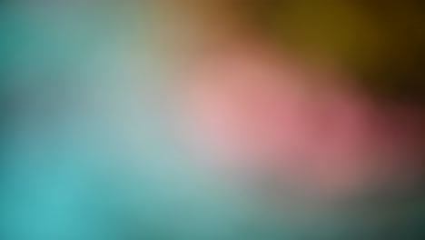 abstract blurred background with blue, pink, and brown hues
