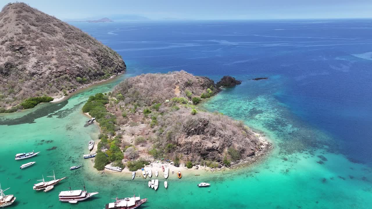 Beautiful aerial view of boats moored near Waecicu Beach, Labuan Bajo, Indonesia
