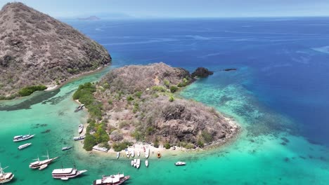 beautiful aerial view of boats moored near waecicu beach, labuan bajo, indonesia