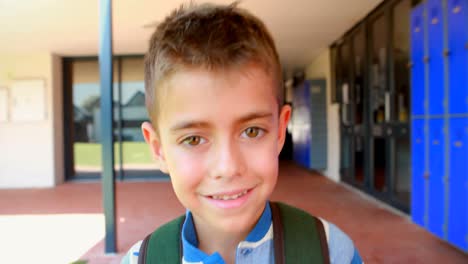 portrait of cute schoolboy walking with backpack 4k