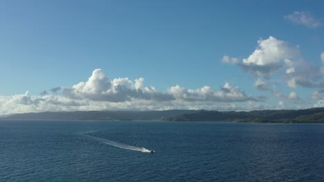 speedboat sailing on blue sea of cayo levantado, samana in dominican republic