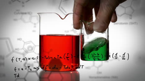 vasos de laboratorio con datos y fórmula estructural de compuestos químicos en primer plano