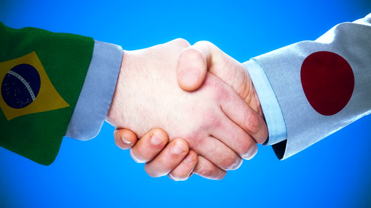 animación conceptual de apretón de manos brasil-japón sobre países y política con el canal matte /