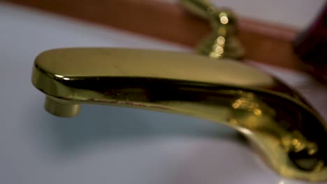 a bathtub with a brass faucet