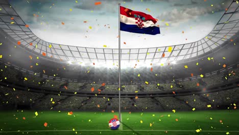 Confetti-falling-over-waving-croatia-flag-against-sports-stadium-in-background