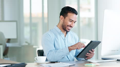 Happy-accountant-browsing-the-internet-on-a-tablet