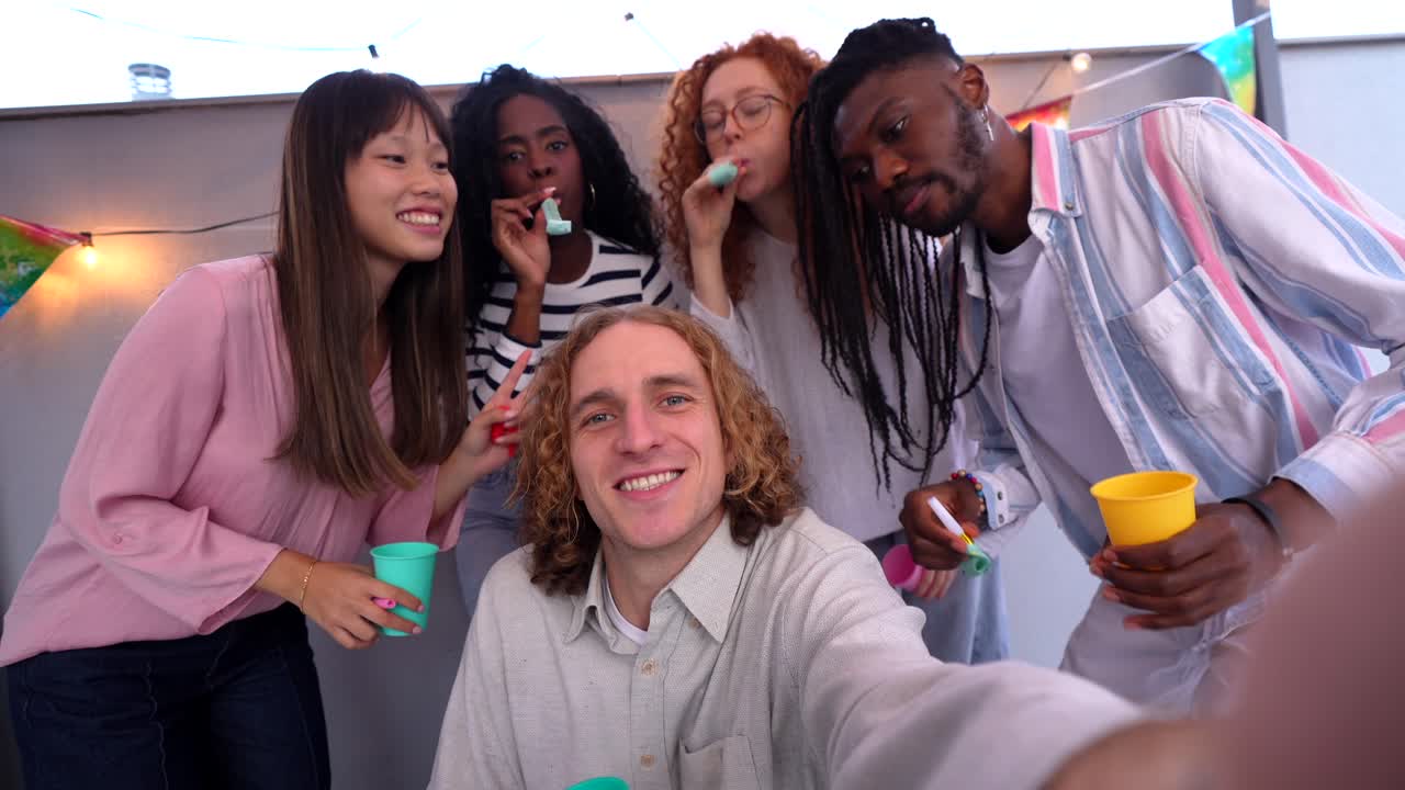 Friends celebrating at a rooftop party