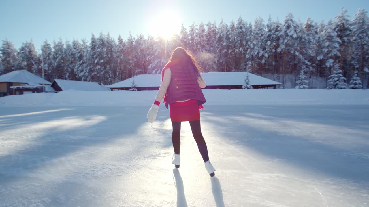 Woman Ice Skating in Winter Wonderland