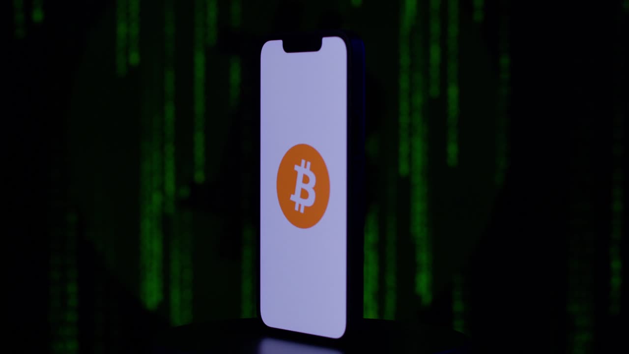 bitcoin en un iphone dando vueltas