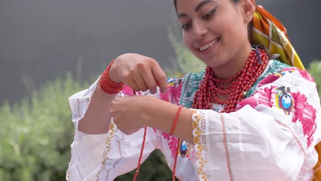 slow motion cinematic clip of a young latina in typical cayambe costume wearing the traditional red handkerchiefs