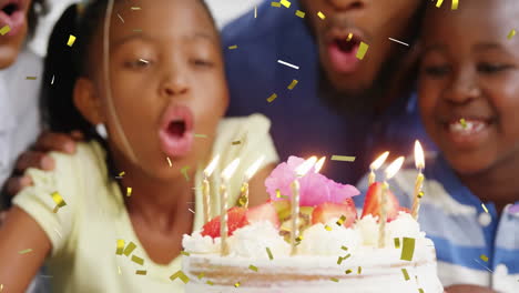 blowing out birthday candles, children celebrating with confetti in school setting