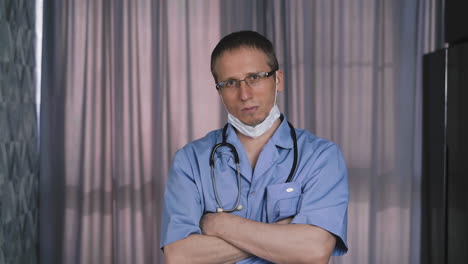 portrait-of-young-doctor-wearing-protective-mask