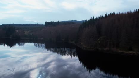 Aerial-panning-shot-of-a-peaceful-Loch-Lochy-at-Spean-Bridge,-Ben-Nevis,-Scotland