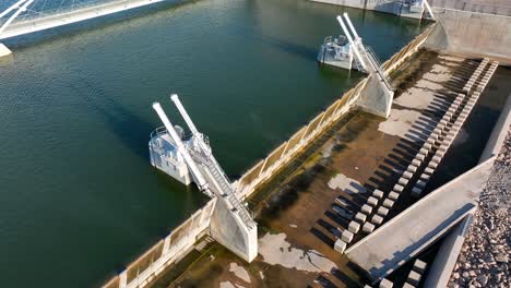 Tempe-Town-Lake,-Arizona:-Aerial-view-of-the-dam-with-open-floodgates