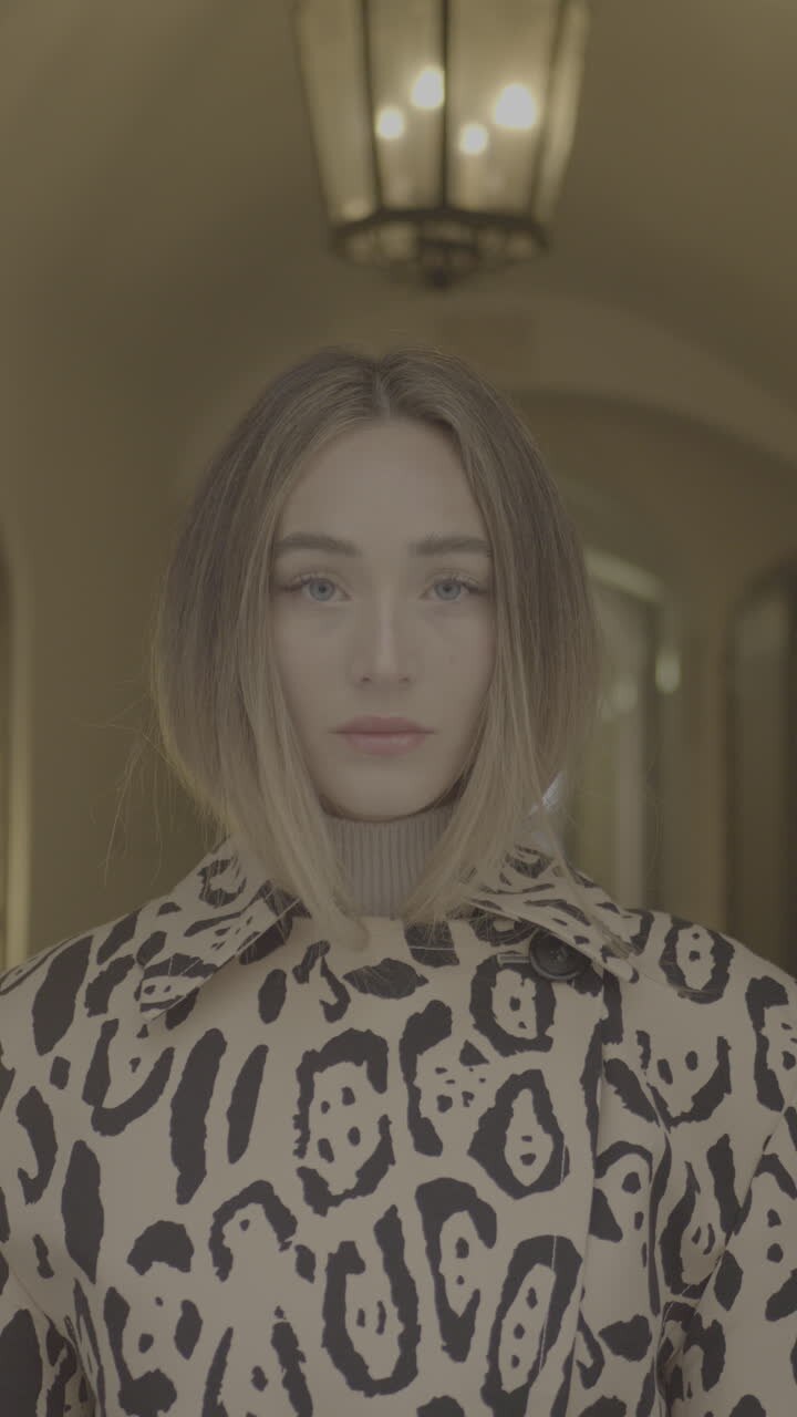 Woman in Leopard Print Coat