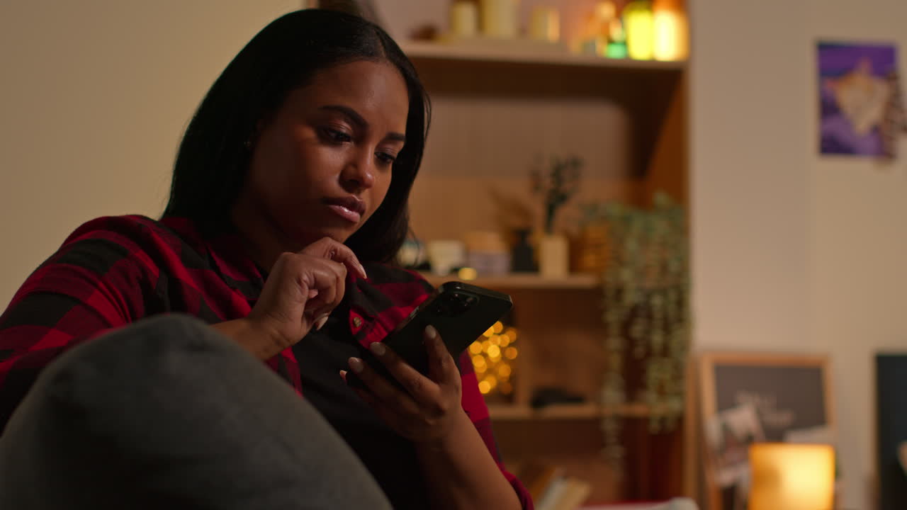 Woman using a smartphone at home