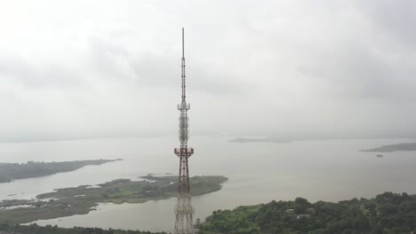 aerial view of a communication tower near a lake