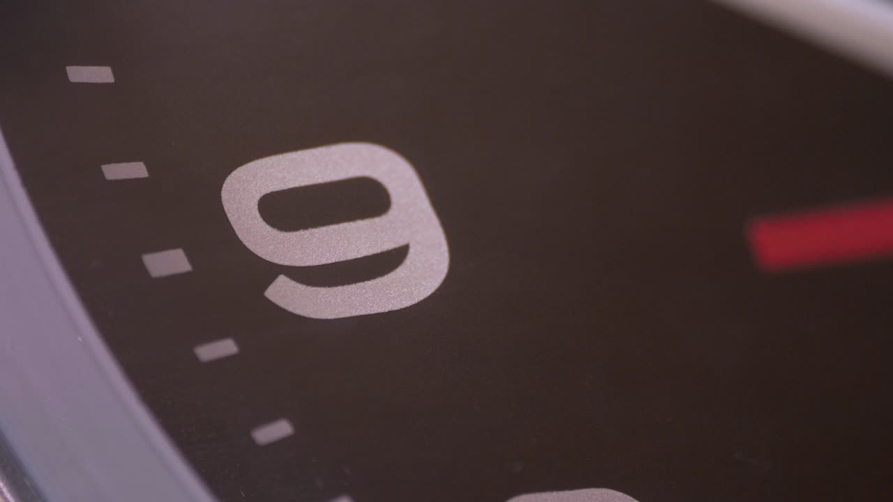 steady cam on nine o'clock - clock hands spinning - macro