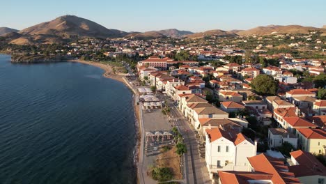 romeikos gialos beach in myrina limnos island greece, aerial dolly shot, serene coastal beauty in north aegean sea
