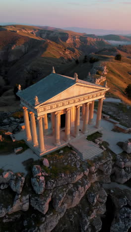 ancient temple on a hilltop at sunrise