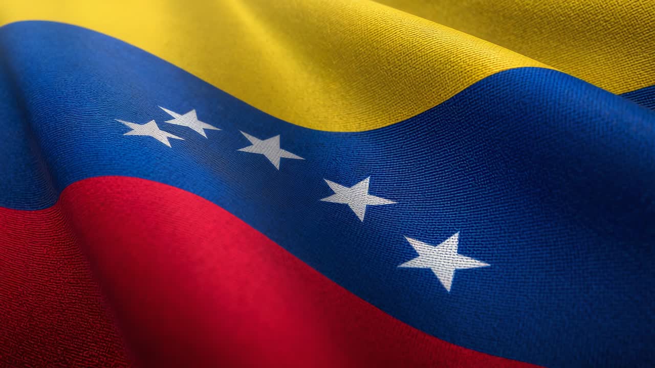 Ondulação da bandeira venezuelana mostrando a textura trançada e estrelas brancas se movendo em close-up, com a brisa começando
