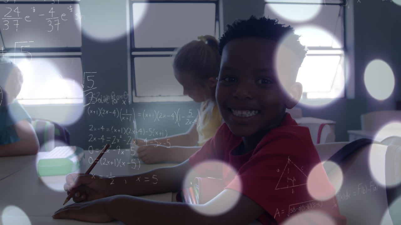 Animation of spots of light and mathematical equations over african american boy studying at school