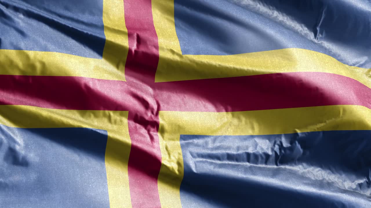 Aland textile flag slow waving on the wind loop. Aland banner smoothly swaying on the breeze. Fabric textile tissue. Full filling background. 20 seconds loop.