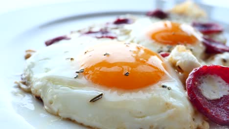 fried eggs with sausage