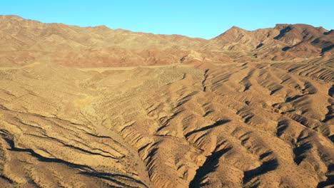 drone-flying-over-Arizona-desert-to-far-off-road