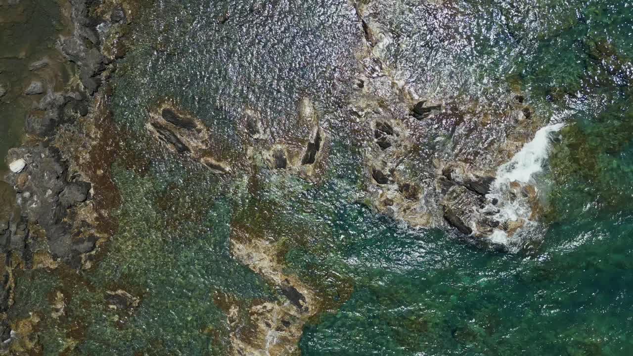 Above View Of Outcrops On The Beach Of Chania In Crete Island, Greece. Aerial Topdown Shot